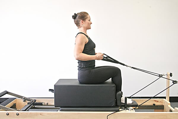 Arms In Straps Back Care On Reformer