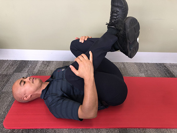 Rolling thoracic mobility back exercise